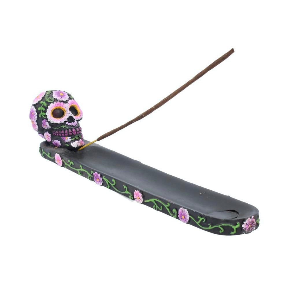 Mexicaanse calavera schedel wierookbrander met violette bloemen