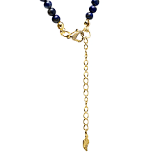 Lapis lazuli halsketting met goudkleurige maan hanger en diepblauwe kralen