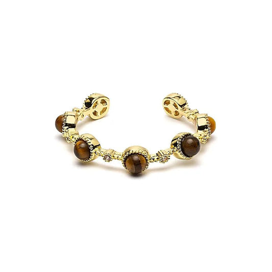 Goudkleurige verstelbare ring met ronde bruine tijgeroog steentjes en open ringband