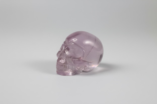 Kleine rozenkwarts schedel van 2 cm in zacht roze