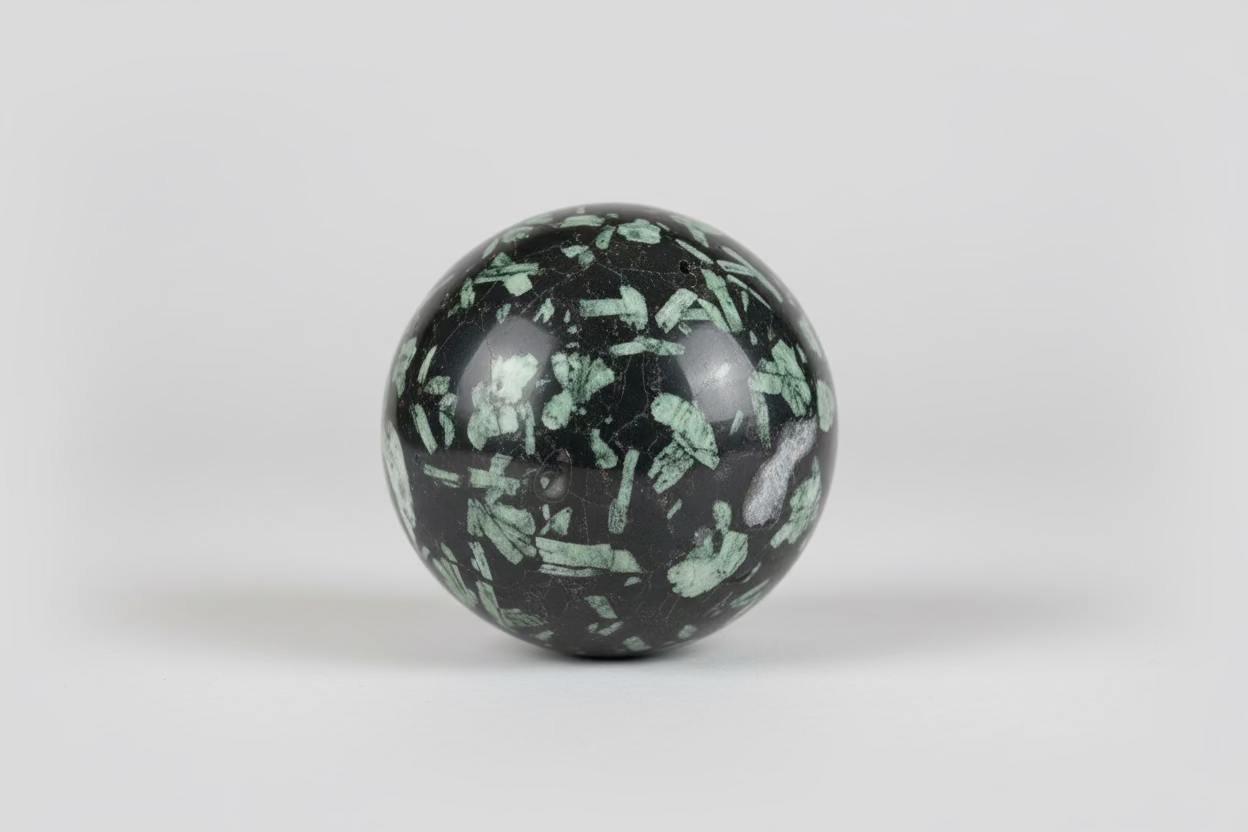 Kambaba jaspis bol van 445 gram met groene oogpatronen