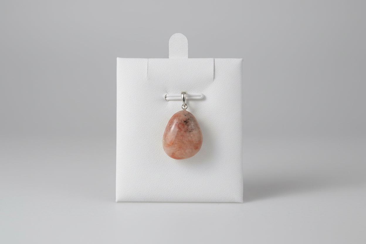 Zonnesteen hanger met gouden schittering