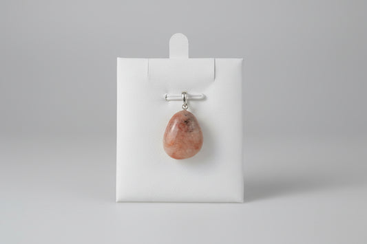 Zonnesteen hanger met gouden schittering