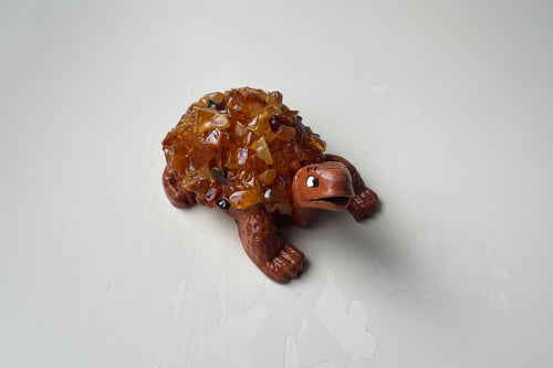 Barnsteen schildpad beeldje voor bescherming