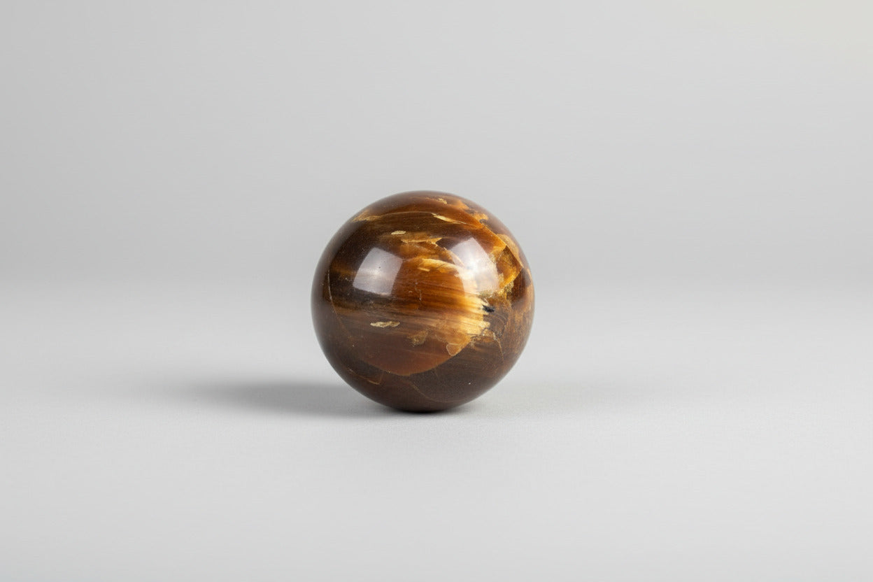 Barnsteen bol met warme gouden kleur