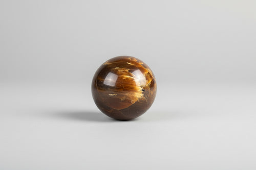 Barnsteen bol met warme gouden kleur
