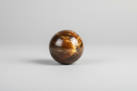 Barnsteen bol met warme gouden kleur