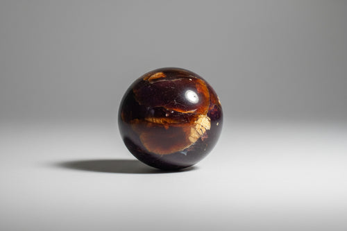 Barnsteen bol met warme gouden kleur