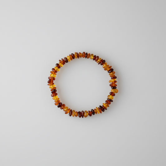 Barnsteen kinder armband met warme kralen